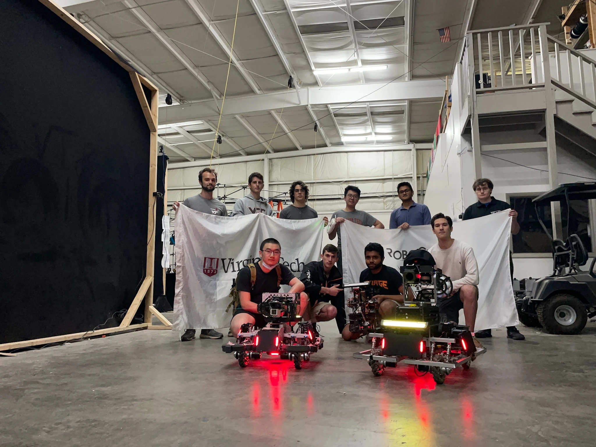 The 2020–2021 team with the competition fleet