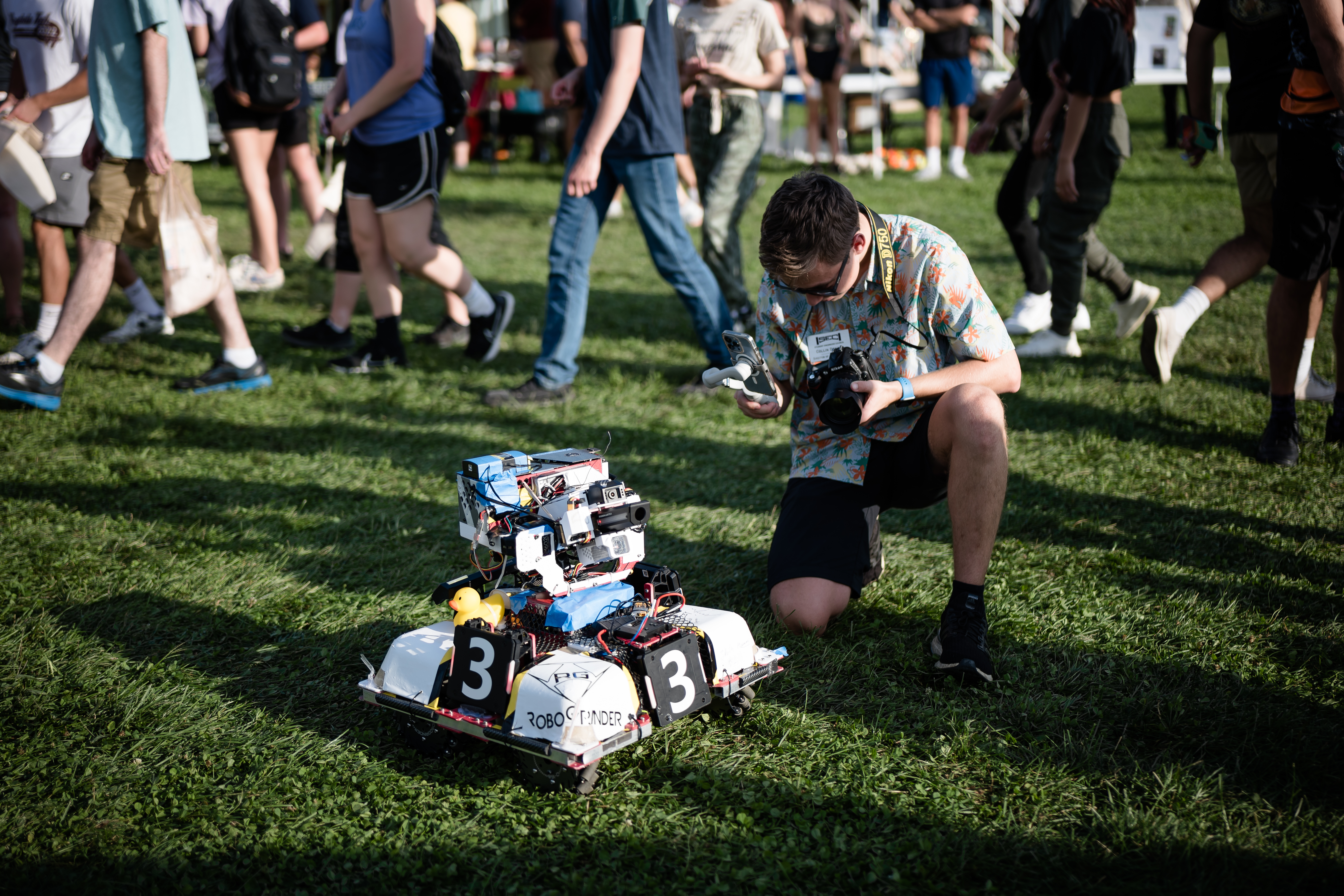 A visitor capturing a closer look at our robot at Gobblerfest 2022