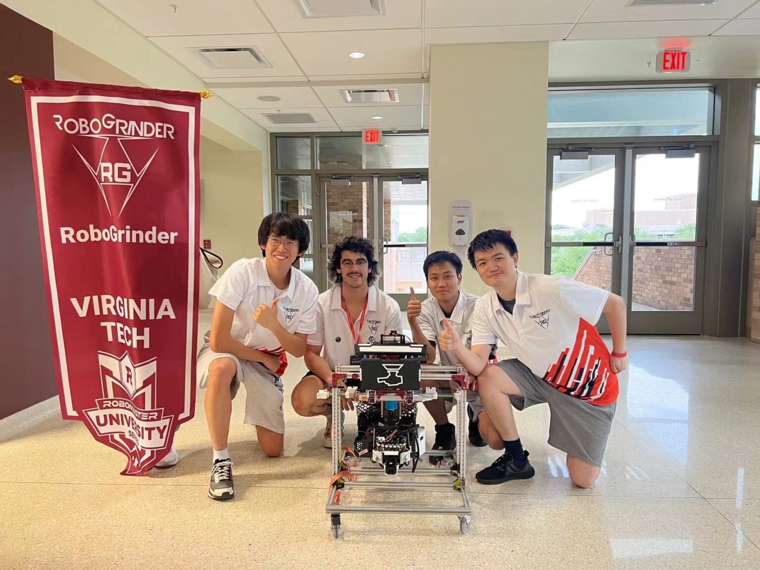 Team members with the Sentry robot