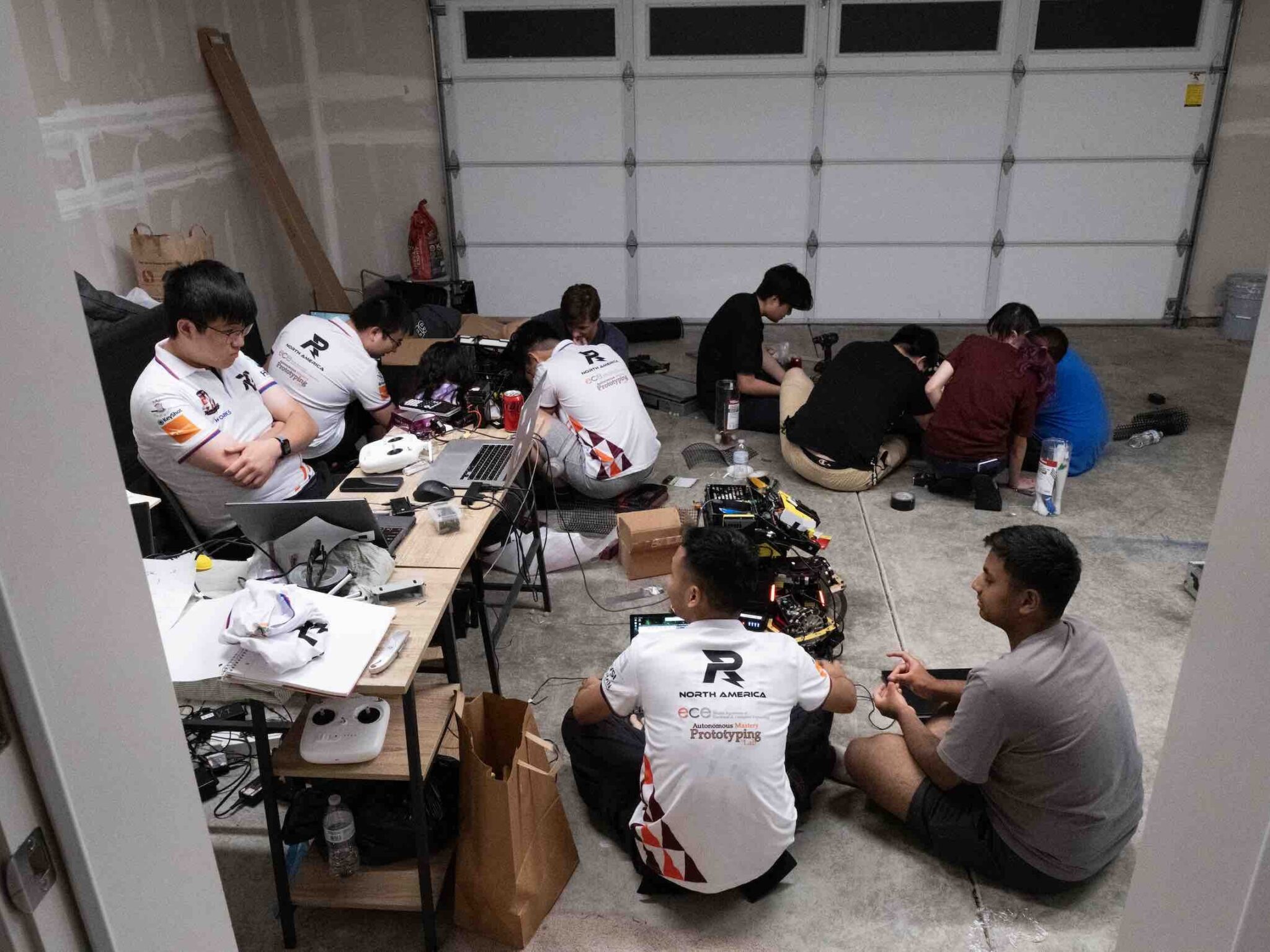 Late-night robot preparations with the team